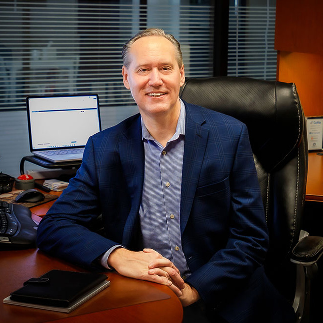 Chris Riegg at Desk v2